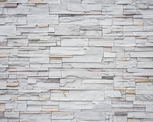 Pattern of grey and rough sandstone wall texture for background