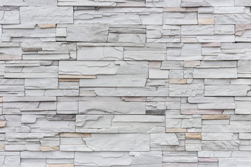 Pattern of grey and rough sandstone wall texture for background