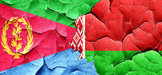 Eritrea flag with Belarus flag on a grunge cracked wall
