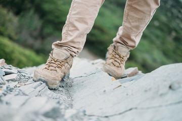 Hiker walking on rocks