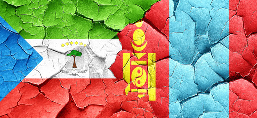 Equatorial guinea flag with Mongolia flag on a grunge cracked wa