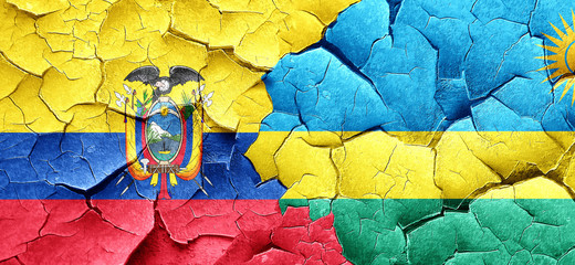 Ecuador flag with rwanda flag on a grunge cracked wall