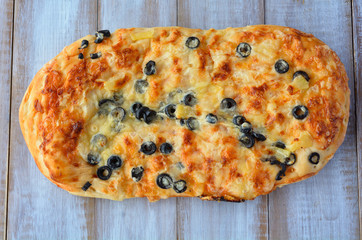 Flat lay of Olive Cheese Focaccia Bread