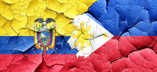 Ecuador flag with Philippines flag on a grunge cracked wall