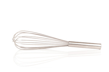 Close up stainless steel egg whisk isolated on white