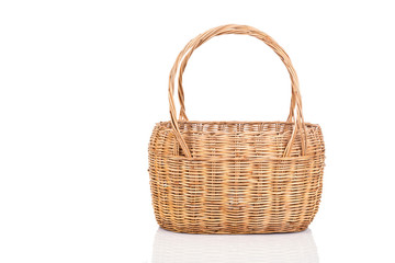 Fototapeta na wymiar Handmade rattan basket isolated on white background