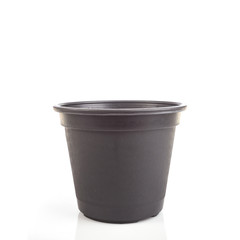 Black empty plastic bucket for seedlings isolated white