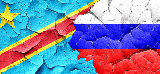 Democratic republic of the congo flag with Russia flag on a grun