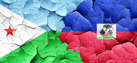 Djibouti flag with Haiti flag on a grunge cracked wall