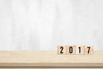 Wooden cubes with 2017 on wooden table background