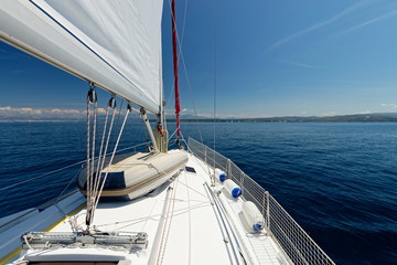 Luxury yacht at sea race. Sailing regatta. Cruise yachting