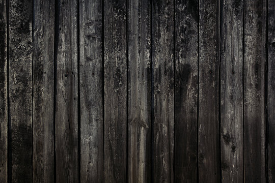 Vintage wooden background.  Оld dark brown boards. Texture. Wood background.