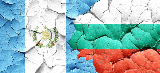 guatemala flag with Bulgaria flag on a grunge cracked wall