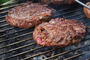 Meat burgers for hamburger grilled on grill