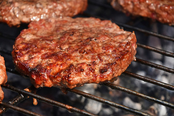 Meat burgers for hamburger grilled on grill