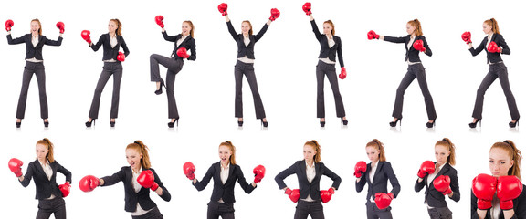 Woman businesswoman with boxing gloves on white