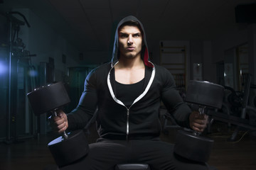 Bodybuilder with dumbbell