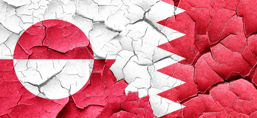 greenland flag with Bahrain flag on a grunge cracked wall