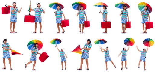 Traveler with red case  and umbrella isolated on white