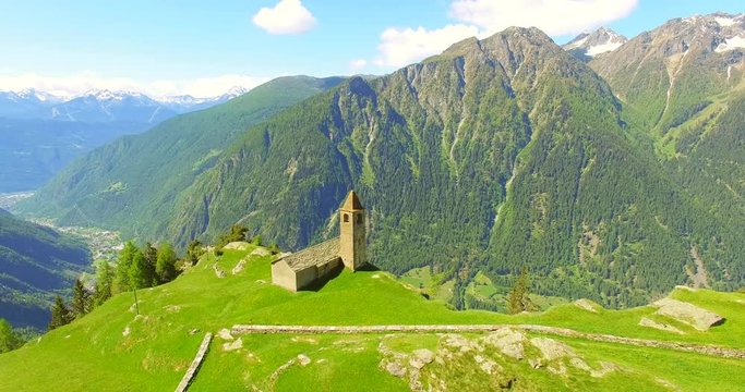 Aerial 4k - Chiesetta di San Romerio (1106) - Valle di Poschiavo - Canton Grigioni - Svizzera 