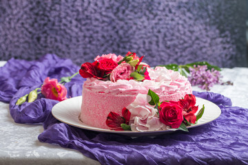 Pink cake with natural beautiful flowers