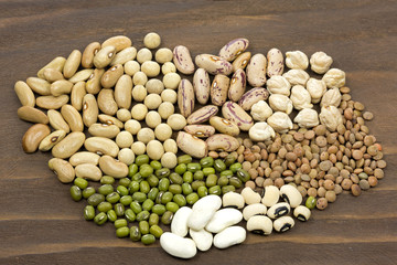 Legumes collection on wooden background