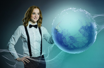 Woman pressing buttons on earth 