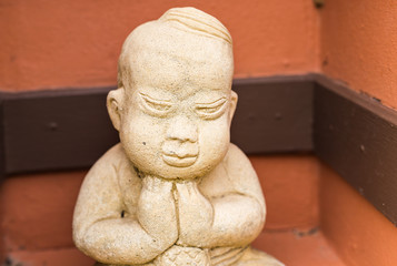 Traditional Thai statuette outdoors