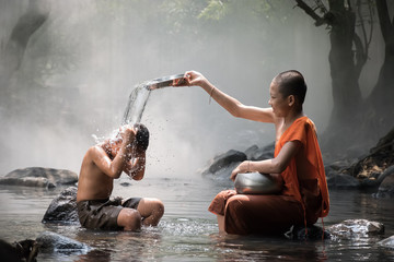 Monk and boy shower