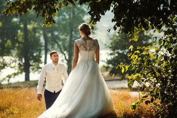 The brides walking in the park