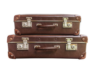 Two vintage brown suitcase on white background