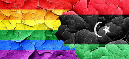 Gay pride flag with Libya flag on a grunge cracked wall