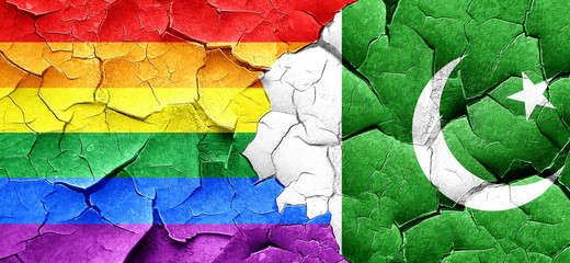Gay pride flag with Pakistan flag on a grunge cracked wall