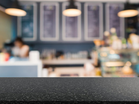 granite countertop with bakery shop background