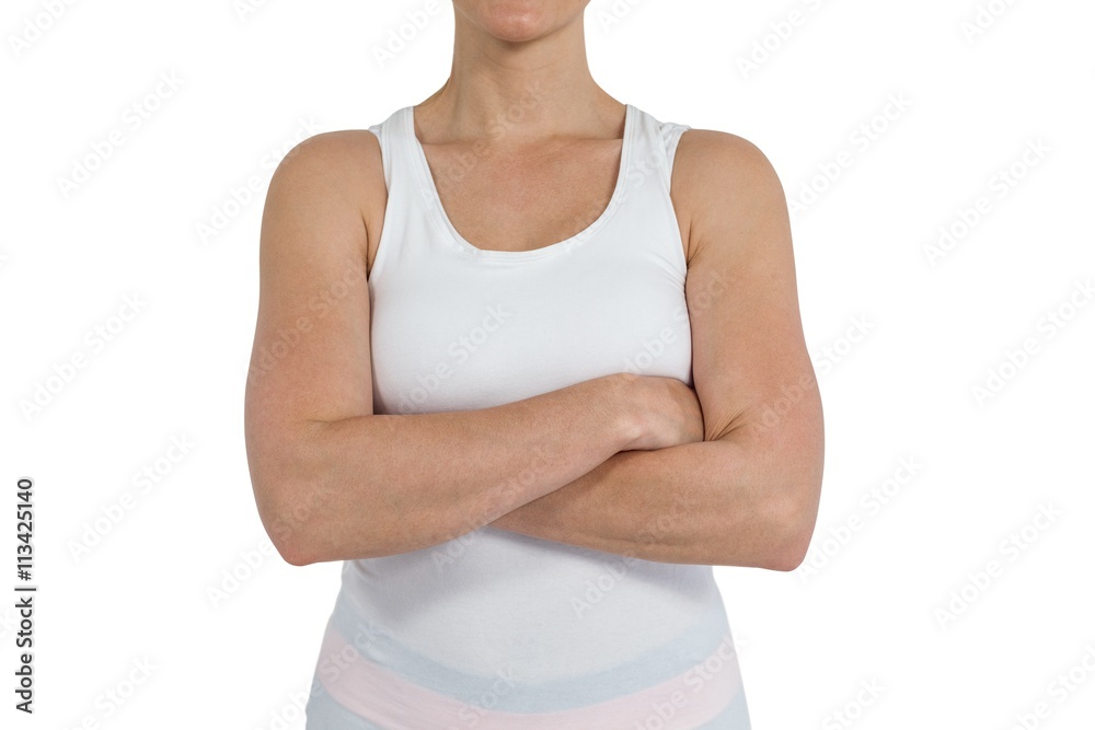 Wall mural Female athlete standing on white background