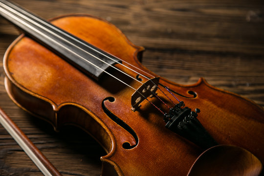 Classic music violin vintage in wooden background