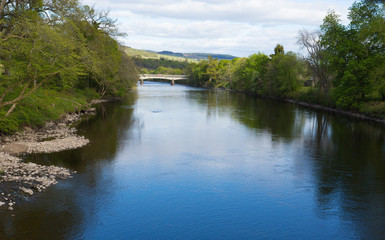 Fototapeta na wymiar Pitlochry Scotland UK River Tummel in Perth and Kinross a popular tourist destination in summer 