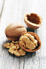 Walnuts on a grey wooden table