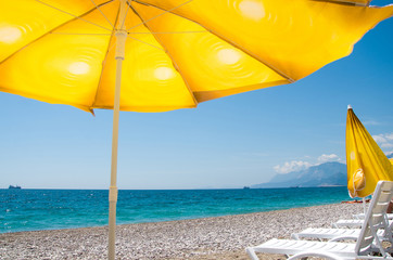 Sunbeds and umbrellas on the beach