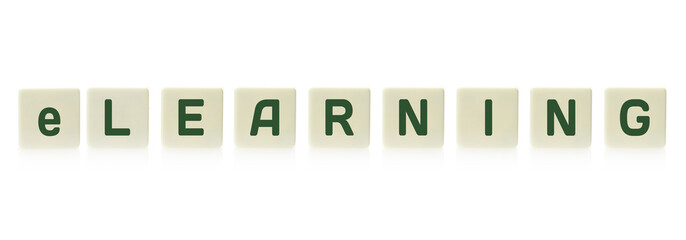 Word "eLearning" on board game square plastic tile pieces, isolated on a white background.