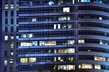 Fototapeta na wymiar Night view to the facade of modern office building in Tel Aviv. 
