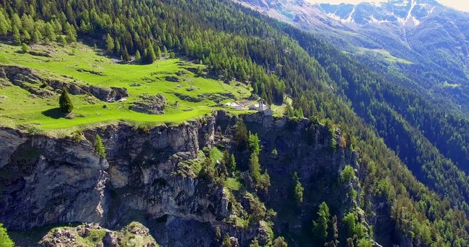Aerial 4k - Chiesetta di San Romerio (1106) - Valle di Poschiavo - Canton Grigioni - Svizzera 