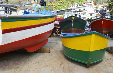 Fototapeta na wymiar Fishing boats at Camara de Lobos, Madeira, Portugal