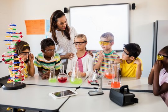 A teacher giving a science lesson 