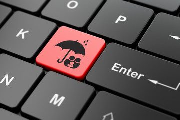 Security concept: Family And Umbrella on computer keyboard background