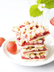 strawberry crumb bars with fresh red berries 