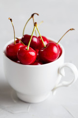 Cherry in white cup