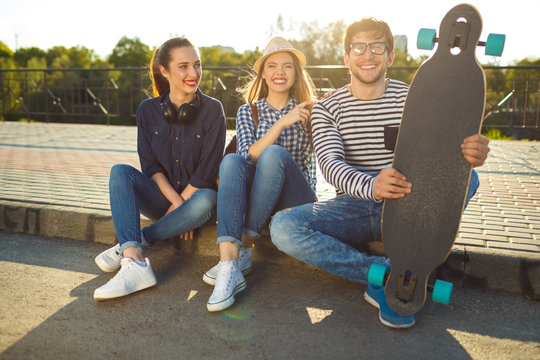 Smiling friends having fun outdoors