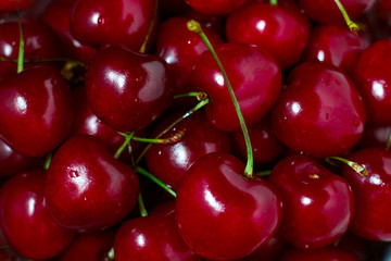 Ripe sweet red cherries background macro