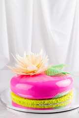 Fototapeta na wymiar Bright pink mousse cake with mirror glaze